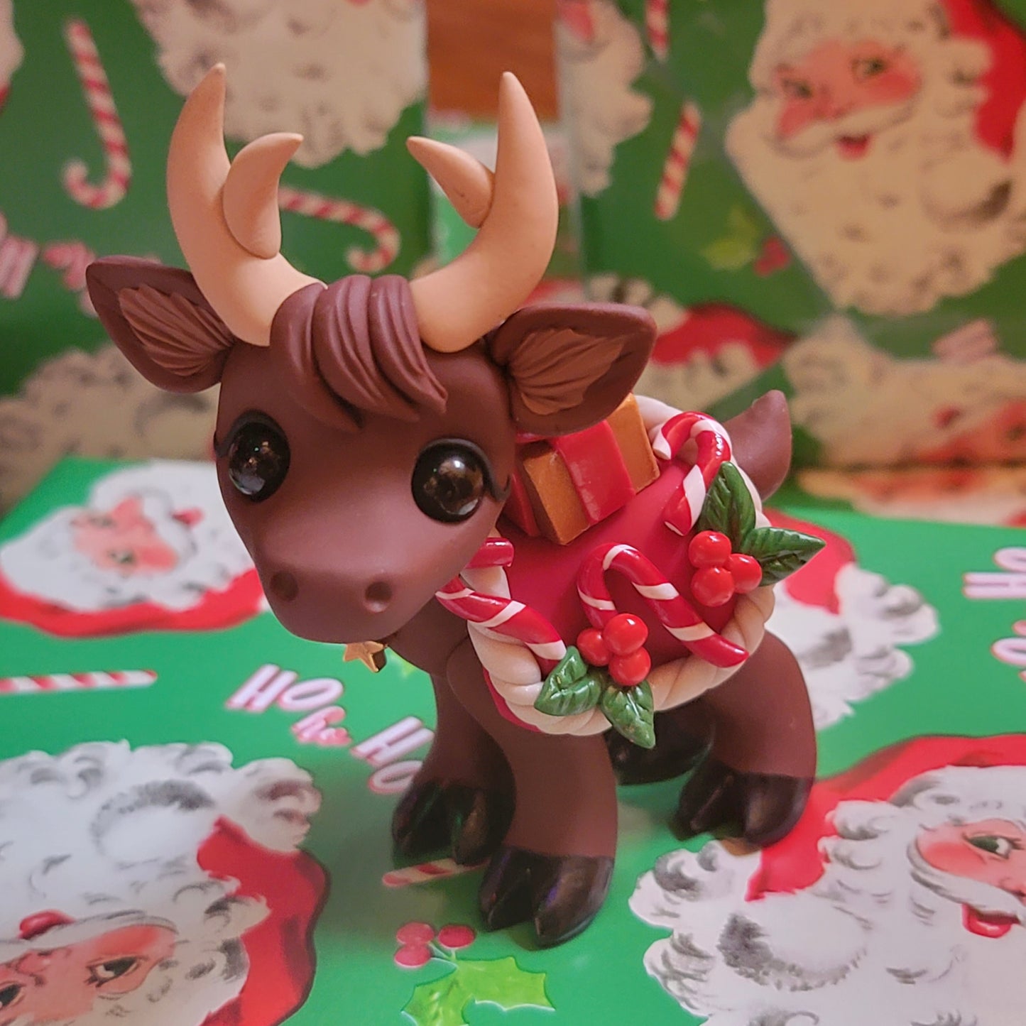 Reindeer w/Blanket and Gifts “Joy”, Reindeer Sculpture