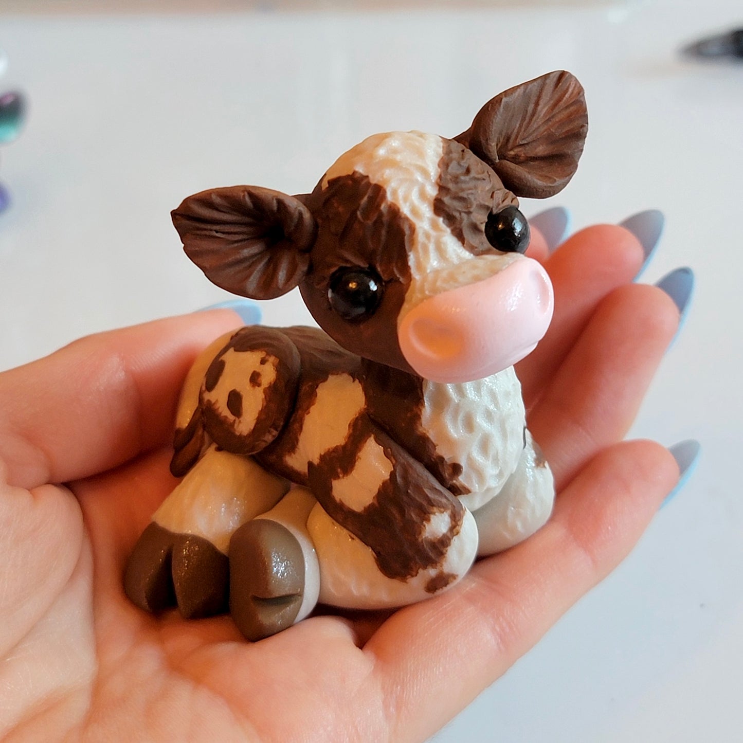 Pinto Cow Calf “Snickers”, Handmade Clay Cow