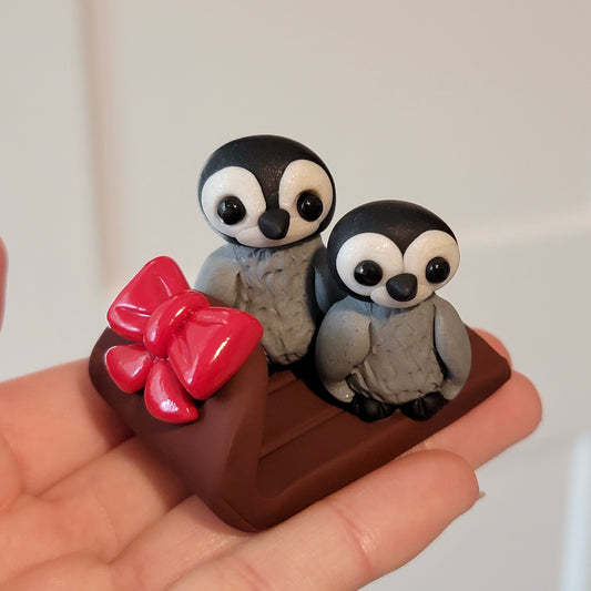 Baby Penguins on Sled, Handmade Clay Penguins