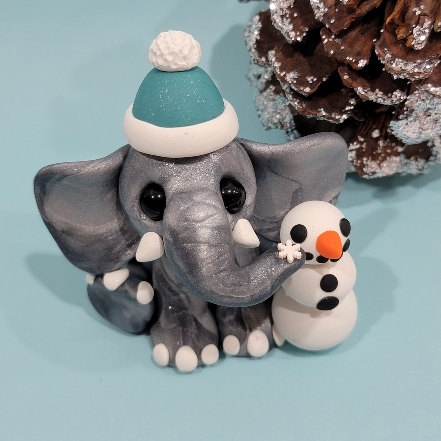 Baby Elephant w/Snowman “Snowy”